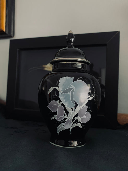 Small black urn