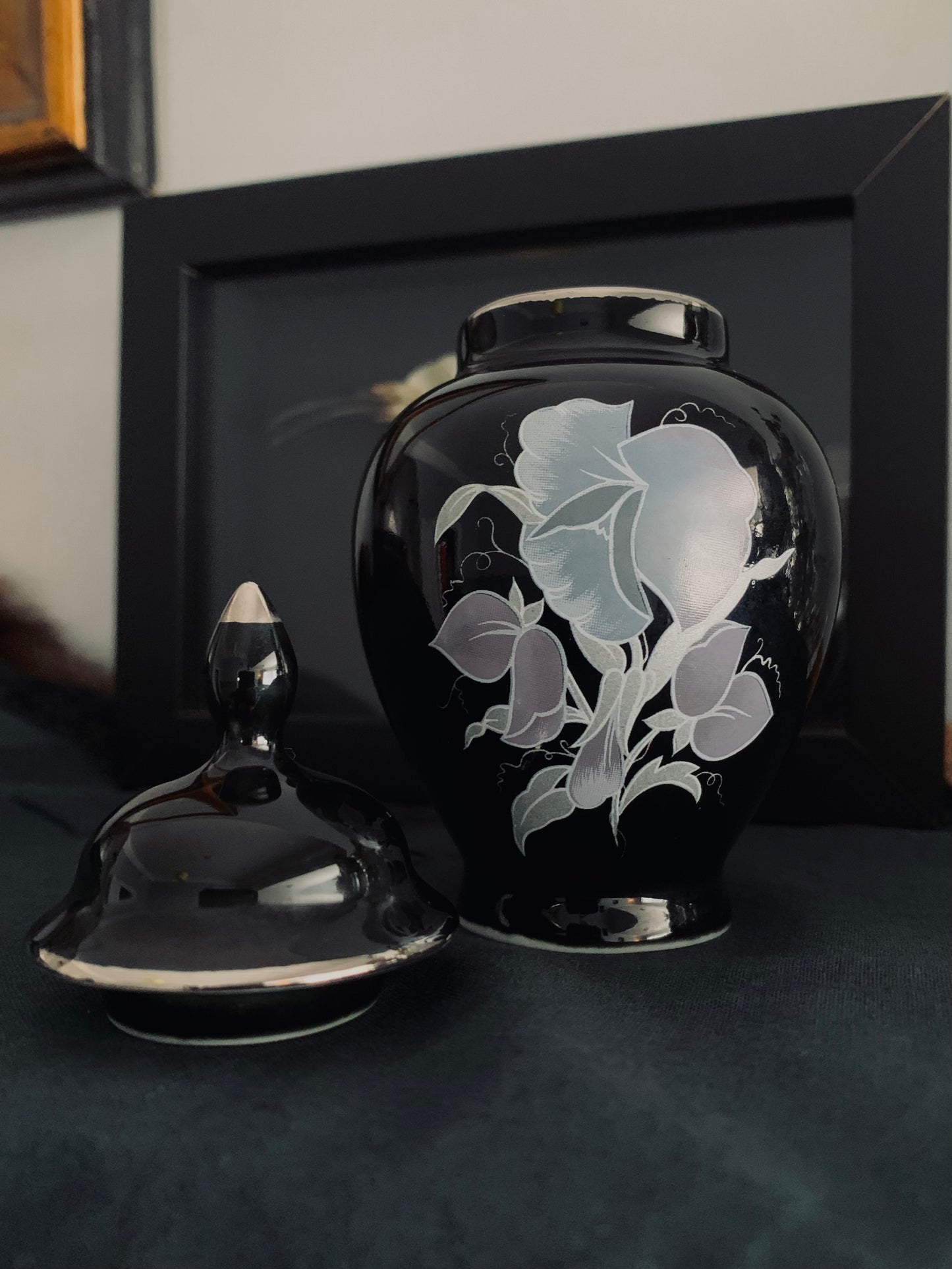 Small black urn
